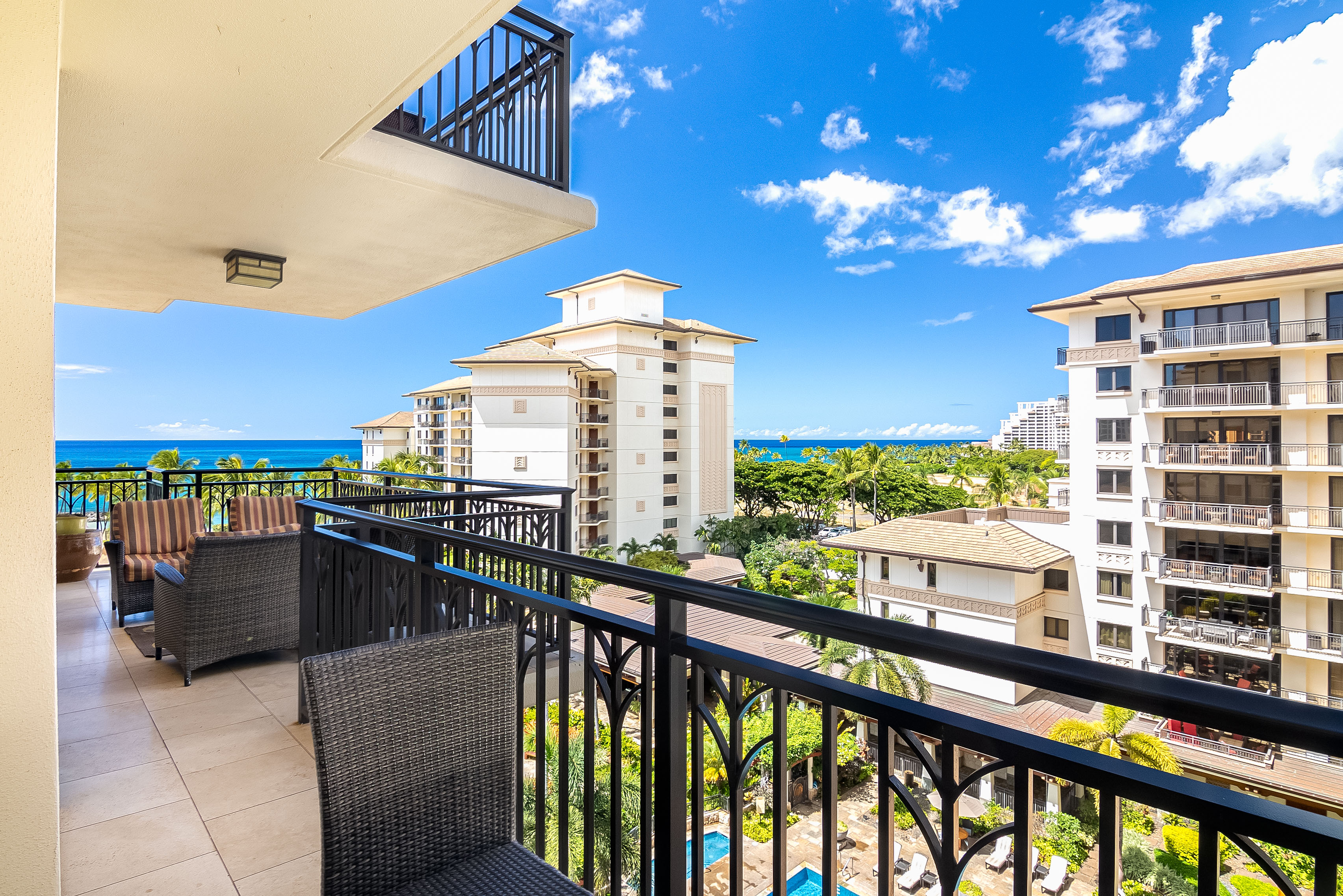 Private lanai seating with views across Beach Villas toward the ocean