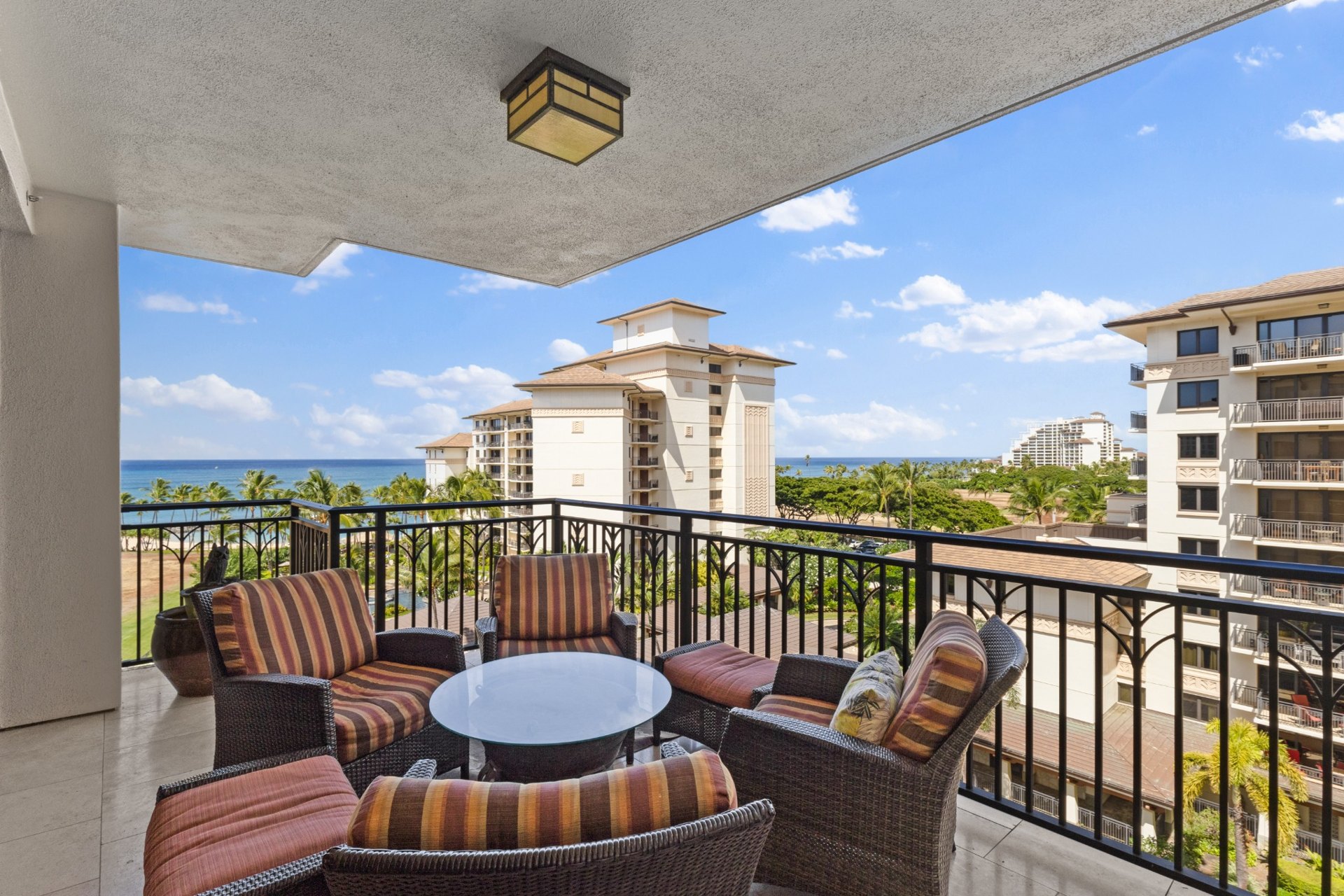 Furnished private lanai overlooking the resort and ocean